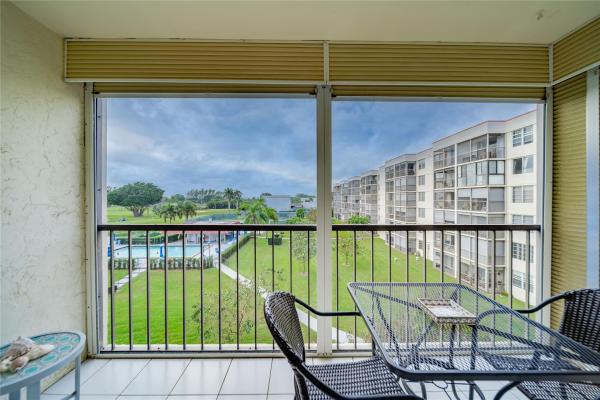 Hollybrook Golf & Tennis Club, 8900 Washington Blvd #404, Pembroke Pines, Florida 33025, image 1