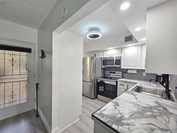 Somerset, 2831 Somerset Dr #105, Lauderdale Lakes, Florida 33311, image 1