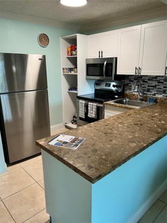 River Manor, 3002 NE 5th Ter #304-B, Wilton Manors, Florida 33334, image 1