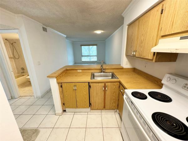 Gathering Place At Cypress Bend, 2216 N Cypress Bend Dr #201, Pompano Beach, Florida 33069, image 2