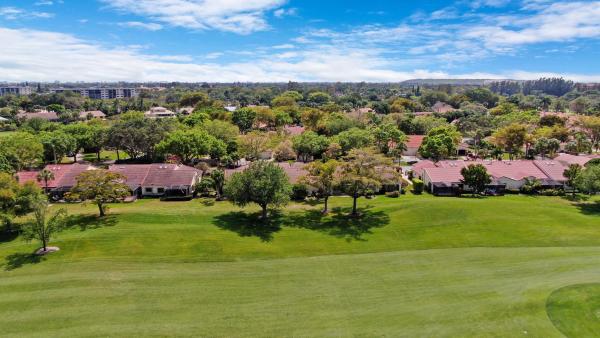 Villas On The Green, 2611 Deer Creek Emerald Way N, Deerfield Beach, Florida 33442, image 2
