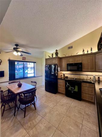 Lake Colony, 7123 Mimosa Way, Tamarac, Florida 33321, image 1
