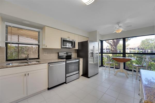 Trader's Crossing North At Jonathan's Landing, 16647 Traders Crossing North #128, Jupiter, Florida 33477, image 1