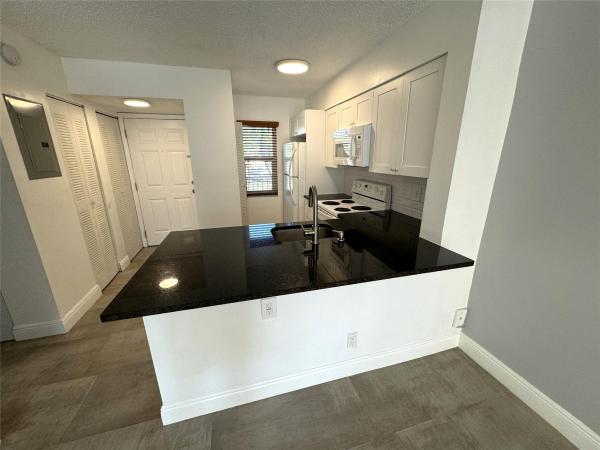 Gathering Place At Cypress Bend, 2106 S Cypress Bend Dr #209, Pompano Beach, Florida 33069, image 1
