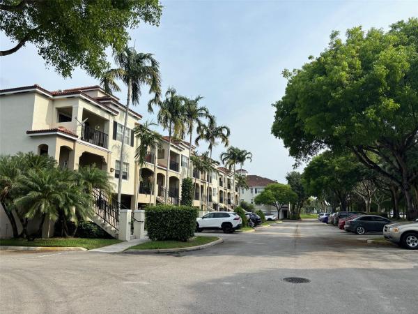 Poinciana Place, 5800 W Sample Rd #203, Coral Springs, Florida 33067, image 1