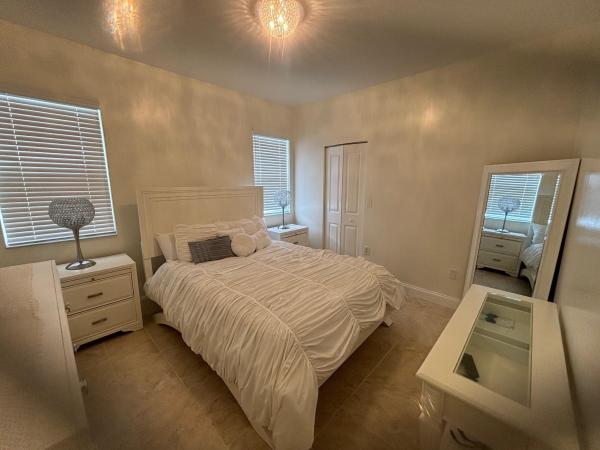 Poinciana Place, 5800 W Sample Rd #203, Lake Worth, Florida 33067, image 2
