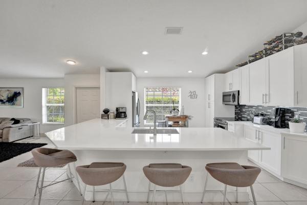 Addison Court At Wyndham Lakes, 5661 NW 117th Ave, Coral Springs, Florida 33076, image 1