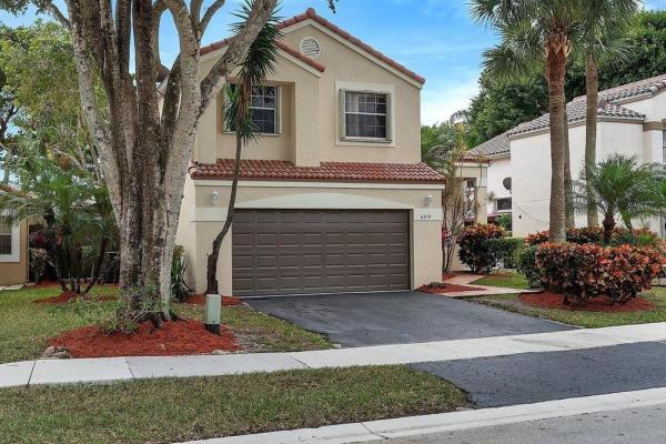 Mill Run Carriage Homes At Terramar, 6370 NW 77th Ct, Parkland, Florida 33067, image 1