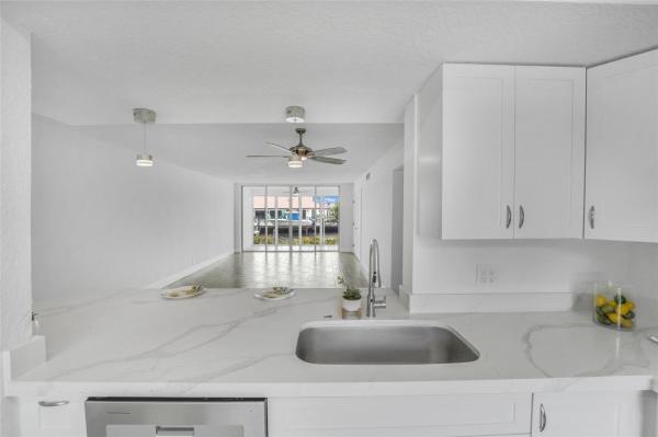 Palm Aire At Coral Key, 3000 NE 48th Ct #105, Lighthouse Point, Florida 33064, image 1