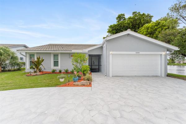 Isles Of Tamarac, 10418 NW 71st Pl, Tamarac, Florida 33321, image 1