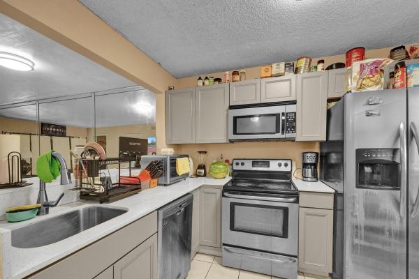 Miramar Club, 3396 Foxcroft Rd #106, Miramar, Florida 33025, image 1