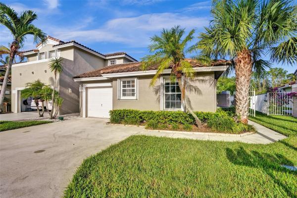 Addison Court At Wyndham Lakes, 5641 NW 117th Ave #5641, Coral Springs, Florida 33076, image 1