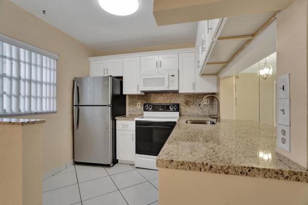Poinciana Place Of Pine Island Ridge, 9420 Poinciana Pl #309, Davie, Florida 33324, image 1
