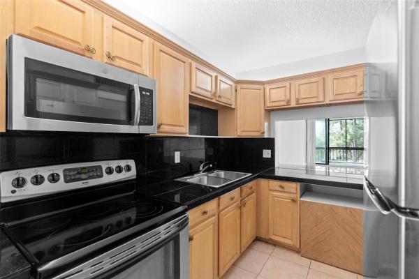 Greenglades, 8421 Forest Hills Dr #303, Coral Springs, Florida 33065, image 1