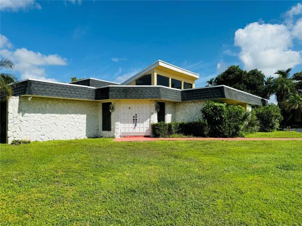 The Woodlands, 5613 S Travelers Palm Ln, Tamarac, Florida 33319, image 1