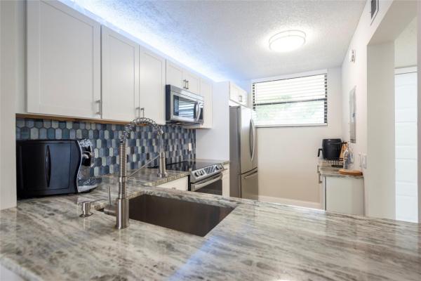 Lake Emerald, 113 Lake Emerald Dr #303, Oakland Park, Florida 33309, image 2