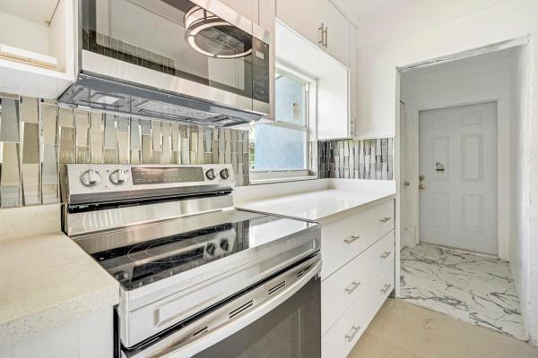 Sun Tan Village, 871 E 14th St, Hialeah, Florida 33010, image 1