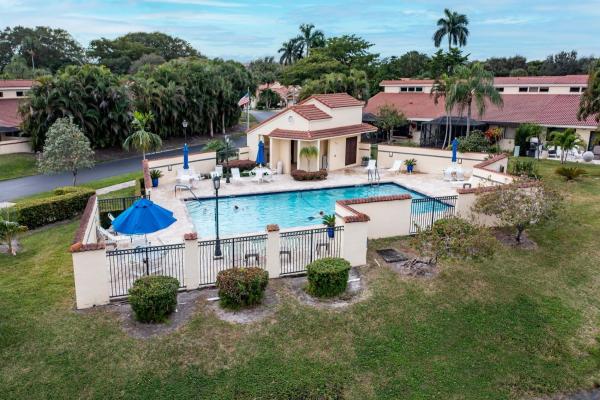 Villas On The Green, 2640 Deer Creek Emerald Way N, Deerfield Beach, Florida 33442, image 1