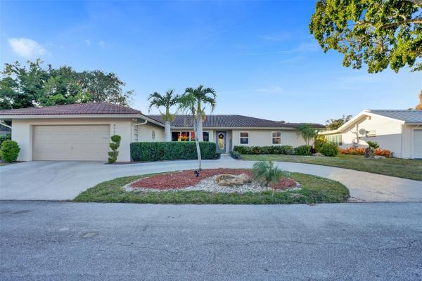 The Woodlands, 4909 N Travelers Palm Ln, Tamarac, Florida 33319, image 1