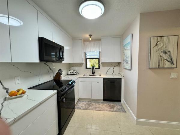 The Palms Of Deer Creek, 2440 Deer Creek Country Club Blvd #305-C, Deerfield Beach, Florida 33442, image 3