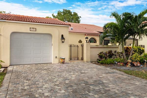 Villas On The Green, 631 Deer Creek Emerald Way E, Deerfield Beach, Florida 33442, image 1