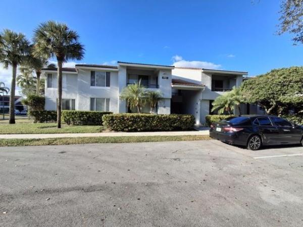 Coco Parc, 931 Lyons Rd #4-208, Coconut Creek, Florida 33063, image 1