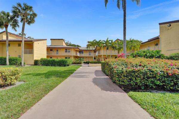 Azalea Court At Woodmont, 8750 Azalea Ct #103, Tamarac, Florida 33321, image 1