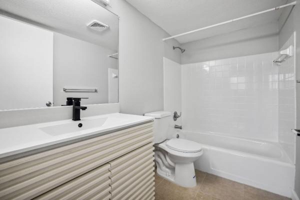The Courtyards At Cimarron, 850 E Commercial Blvd #214B, Oakland Park, Florida 33334, image 1