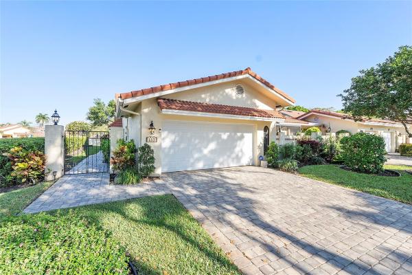 Villas On The Green, 603 Deer Creek Emerald Way East, Deerfield Beach, Florida 33442, image 1