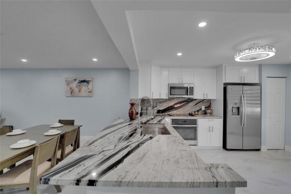 Cambridge At Century Village, 901 SW 128th Ter #106A, Pembroke Pines, Florida 33027, image 1