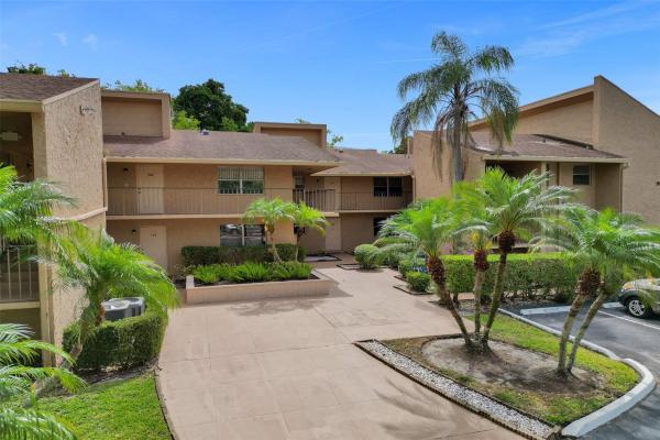 The Atrium At Woodmont, 7582 NW 86th Ter #103, Tamarac, Florida 33321, image 1