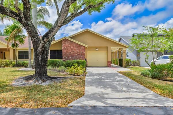 Tamarind Village, 2433 Fiddleleaf Ave, Coconut Creek, Florida 33063, image 1