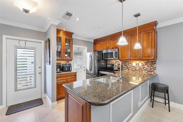 Elm Gardens, 5051 W Oakland Park Blvd #301, Lauderdale Lakes, Florida 33313, image 1