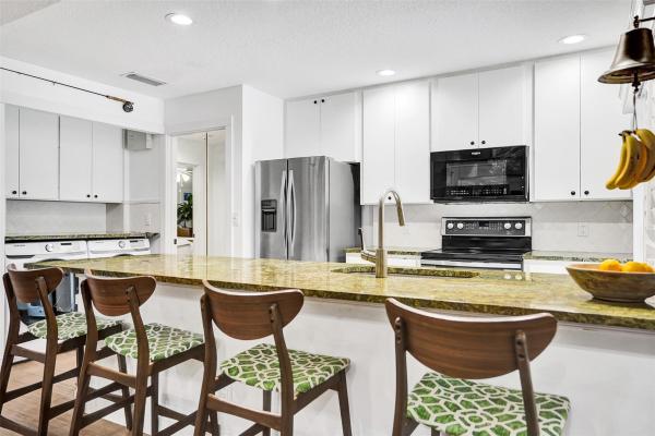 Sun Terrace At The Oaks, 10002 Chapman Oak Ct, Palm Beach Gardens, Florida 33410, image 1