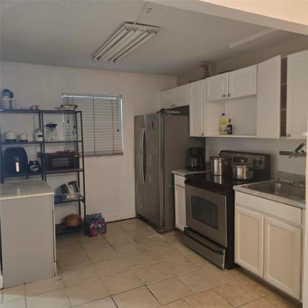 Foxwood Hollow At Coral Springs, 3000 Riverside Dr #208-1, Coral Springs, Florida 33065, image 1