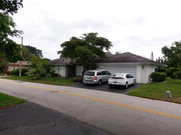 The Woodlands, 4802 Queen Palm Ln, Tamarac, Florida 33319, image 1