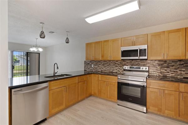 Pineapple Park At Woodmont, 8113 NW 71st Ct #8113, Tamarac, Florida 33321, image 1