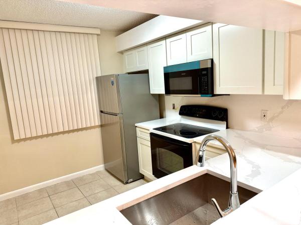 Whitehall Of Pine Island Ridge, 1502 Whitehall Dr #104, Davie, Florida 33324, image 1
