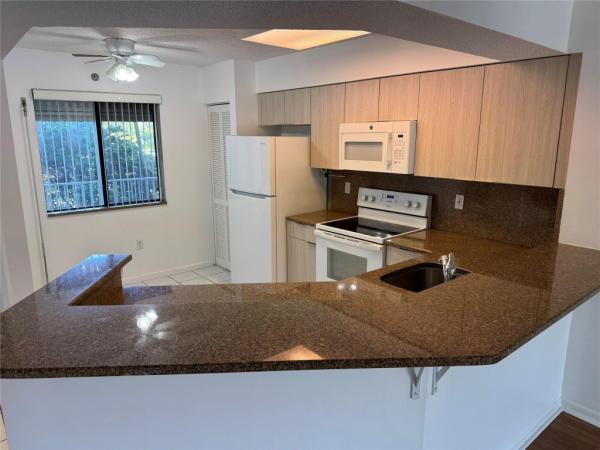 Water Chase At Cypress Bend, 2334 S Cypress Bend Dr #208, Pompano Beach, Florida 33069, image 1