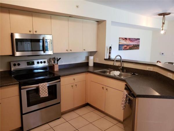 Emerald Isle At Laguna Lakes, 4101 San Marino Blvd #108, West Palm Beach, Florida 33409, image 1