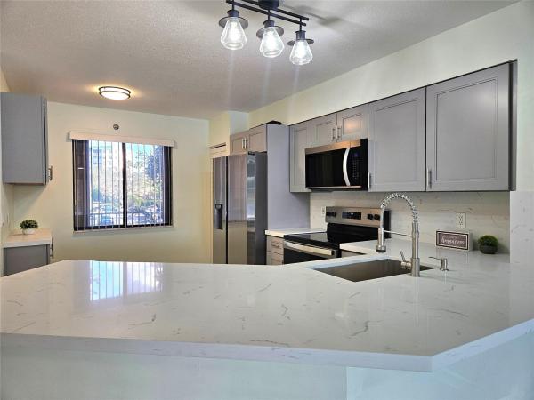 Water Chase At Cypress Bend, 2232 N Cypress Bend Dr #208, Pompano Beach, Florida 33069, image 1