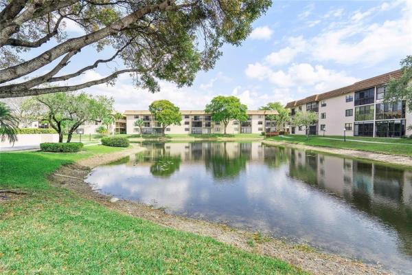 Lakes Of Carriage Hills, 4955 E Sabal Palm Blvd #104, Tamarac, Florida 33319, image 1