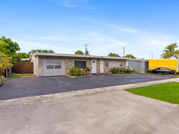 Bonnie Loch, 311 W Sample Rd, Deerfield Beach, Florida 33064, image 1