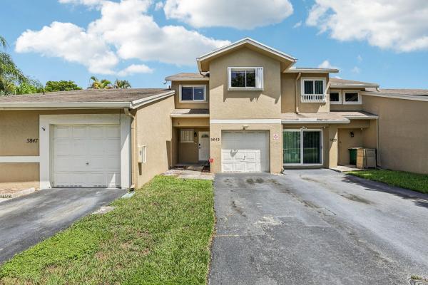 Woodland Cove, 5843 Woodlands Blvd, Tamarac, Florida 33319, image 1