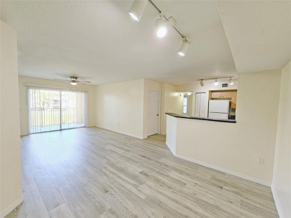 Emerald Isle At Laguna Lakes, 4151 San Marino Blvd #208, West Palm Beach, Florida 33409, image 1