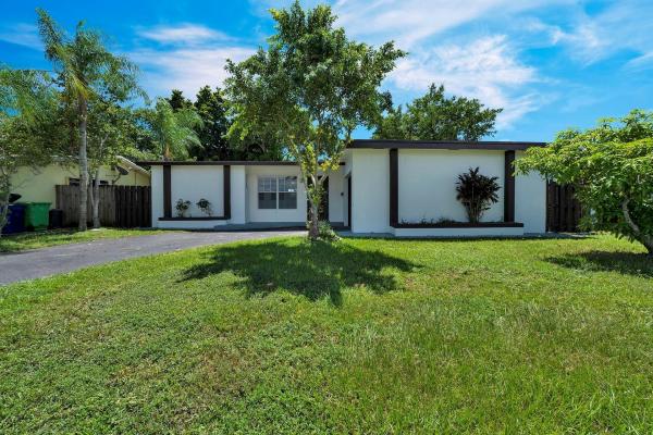 Sunrise Golf Village, 8360 NW 25th Ct, Sunrise, Florida 33322, image 1