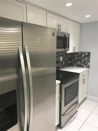 Patios Of Oakwood, 9576 SW 1st Ct #9-F, Coral Springs, Florida 33071, image 1