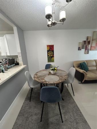 The Greens Of Tamarac, 8818 W Mcnab Rd #303, Tamarac, Florida 33321, image 1