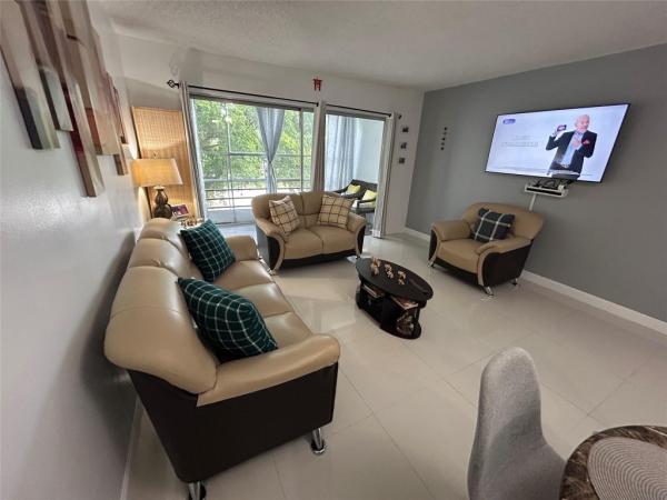 The Greens Of Tamarac, 8818 W Mcnab Rd #303, Tamarac, Florida 33321, image 1