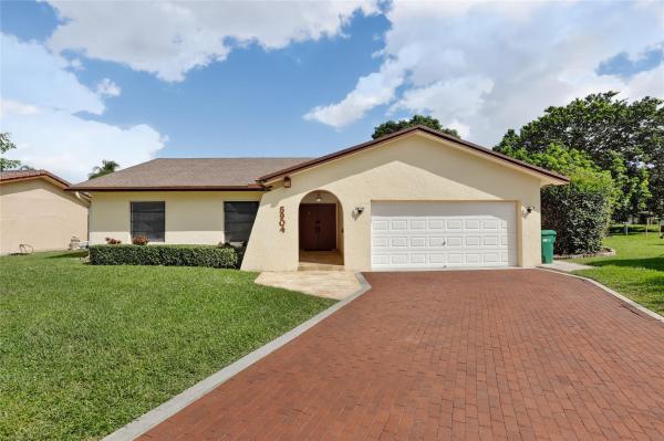 The Woodlands, 5904 Blue Beech Ct, Tamarac, Florida 33319, image 1